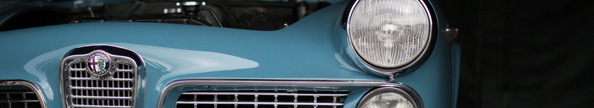 Alfa Romeo light blue standing in the garage and dark